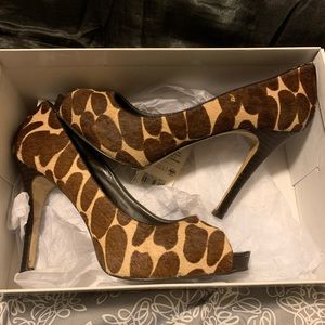 Leopard print peep toe pumps